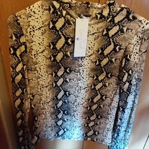 Leopard style shirt from love streak. Size large.